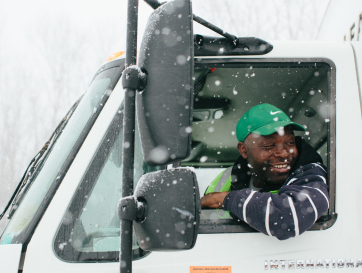 Man looking out a truck window