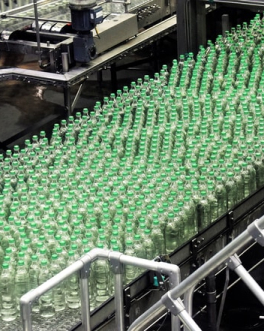 Glad bottles on a conveyor belt