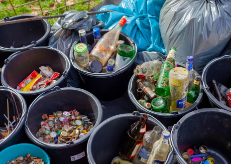 Recyclables separated into different buckets