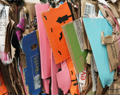 Stack of crushed cardboard for recycling