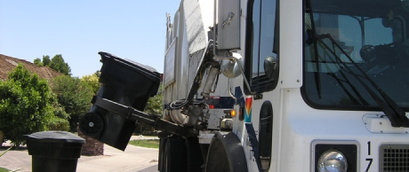 Recycling truck holding a bin