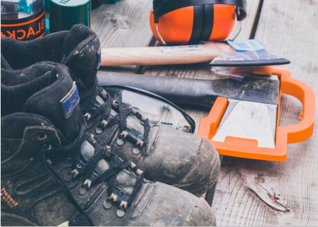 Workboots and tools on a table